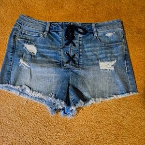 Cute short shorts with lace up front. Size 10,made by refuge.